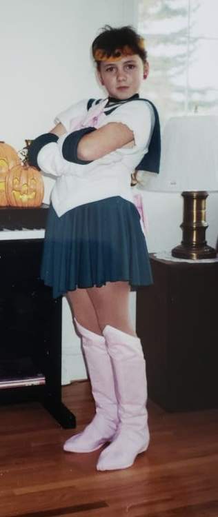 10-year-old me dressed as Sailor Jupitor for Halloween.
